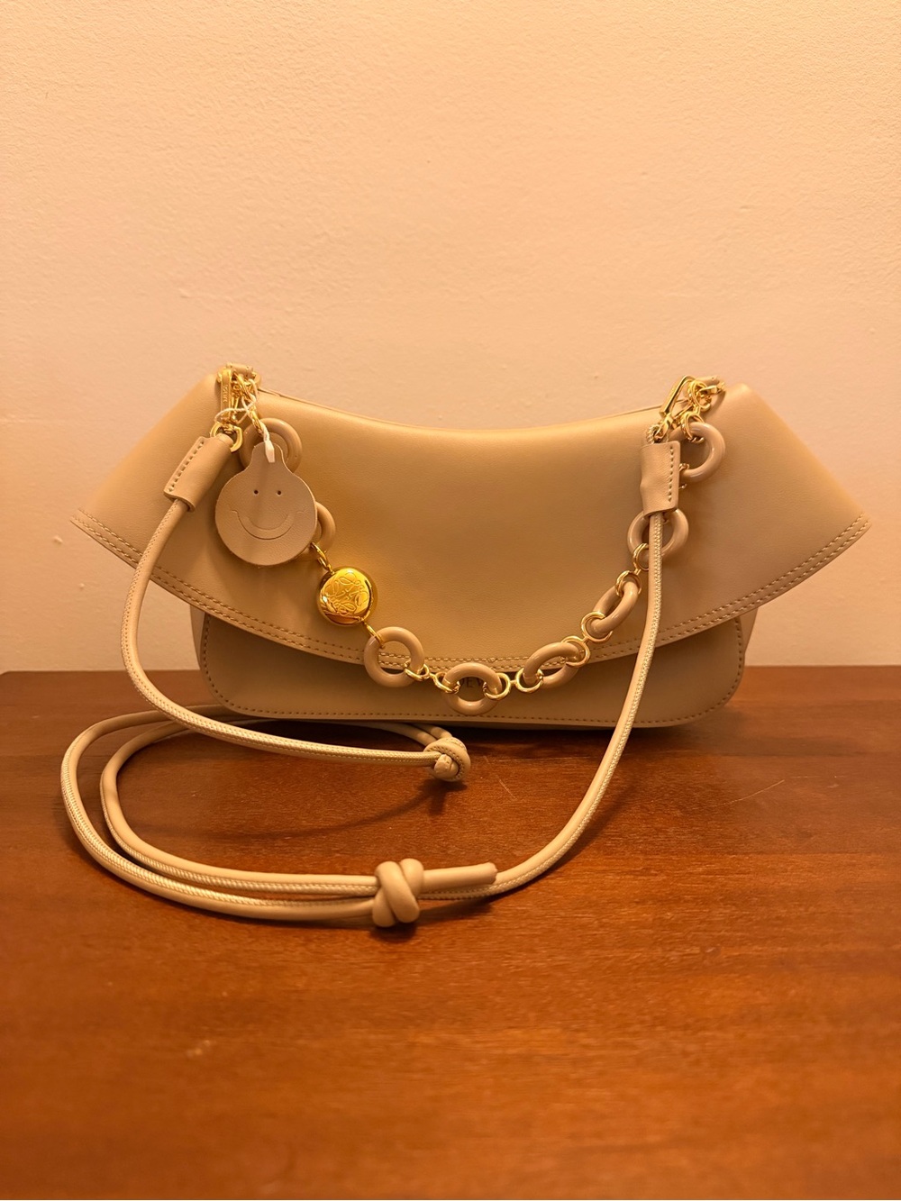 Donut Ola Style Cream Crescent Shoulder Bag with Gold Chain Charm